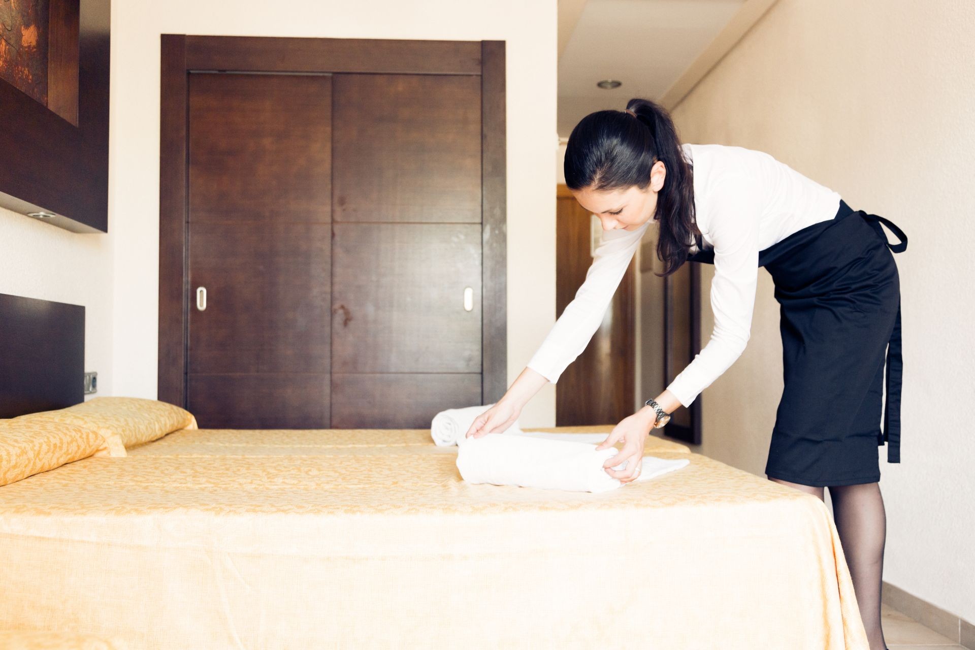 Maid Making A Hotel Room